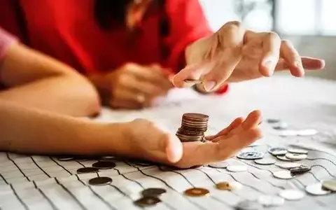 Couple counting coins together