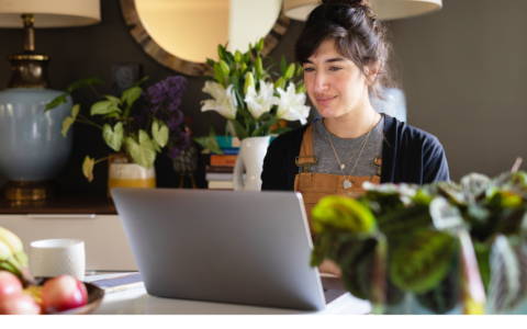 Person working at her home on her laptop