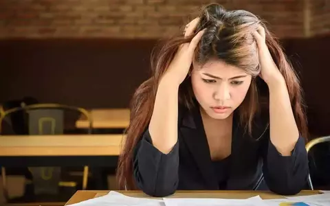 Depressed Stressed Frustrated Businessperson Working At Office Desk